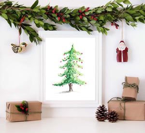 Watercolor woodland Christmas tree with red christmas bulbs shown in a white frame  surrounded by christmas decorations