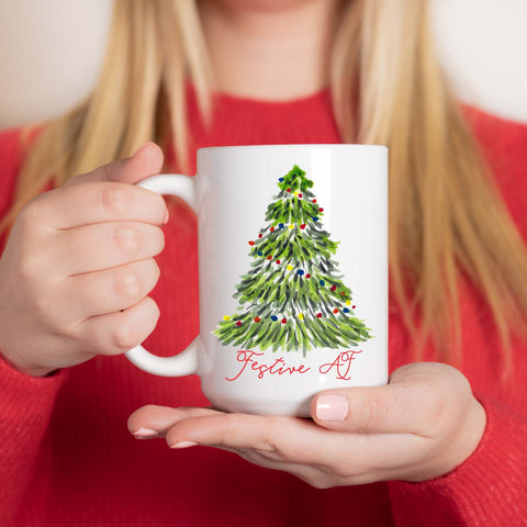 15oz white ceramic mug with watercolor christmas tree with colorful lights that says festive af