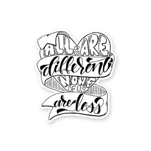 3" hand lettered, illustrated, black and white vinyl sticker saying all of us are different none of us are less